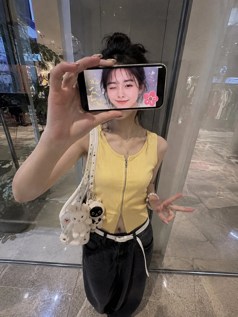Ultra-realistic creative iPhone portrait of a stylish Japanese woman stan...