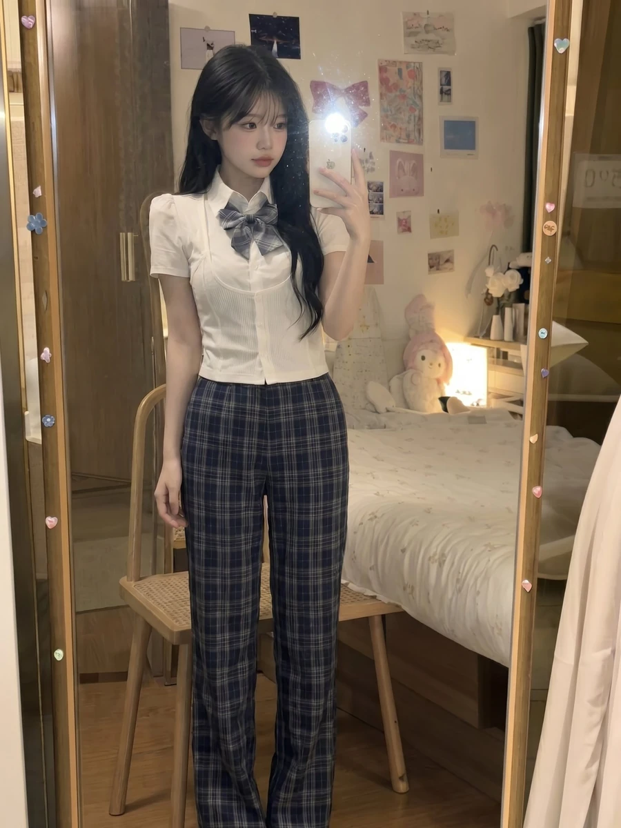Ultra-realistic smartphone mirror selfie of a beautiful young East Asian...