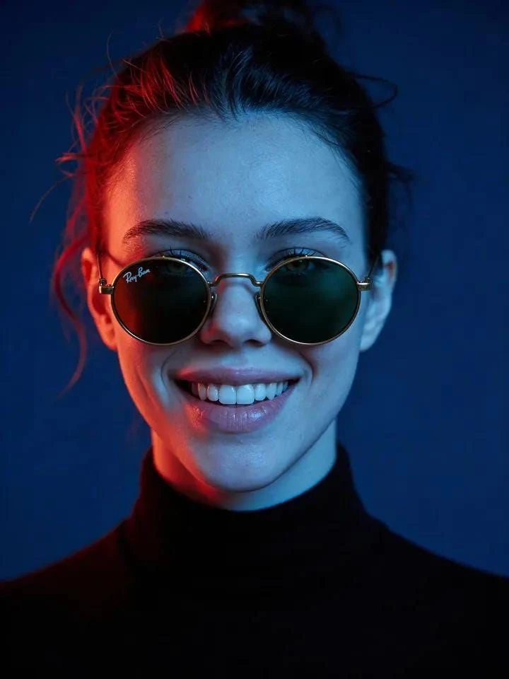Ultra-realistic cinematic portrait of a young woman wearing round vintage...