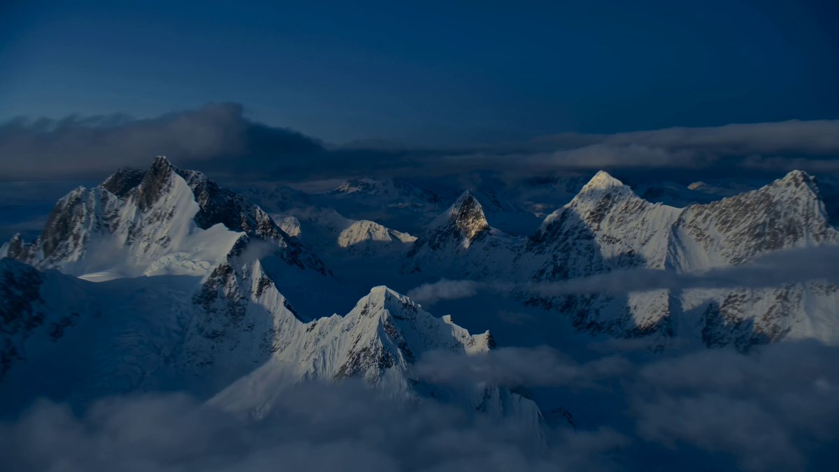 cinematic mountain rescue video, captured entirely in one single continuo...
