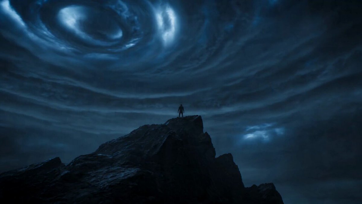 15-second ultra-cinematic elemental transformation sequence on a mountain...