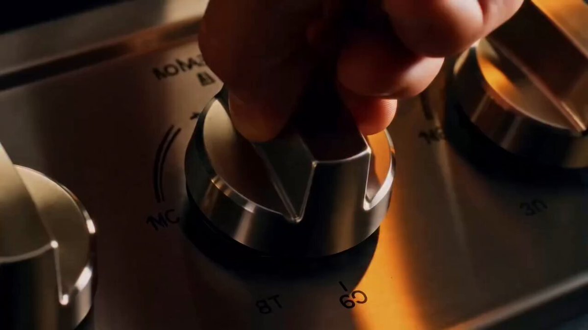 A fast-paced, high-octane cinematic cooking commercial of a crispy chicke...