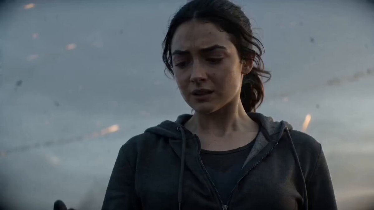 A dramatic cinematic transformation of a young woman with dark hair into...