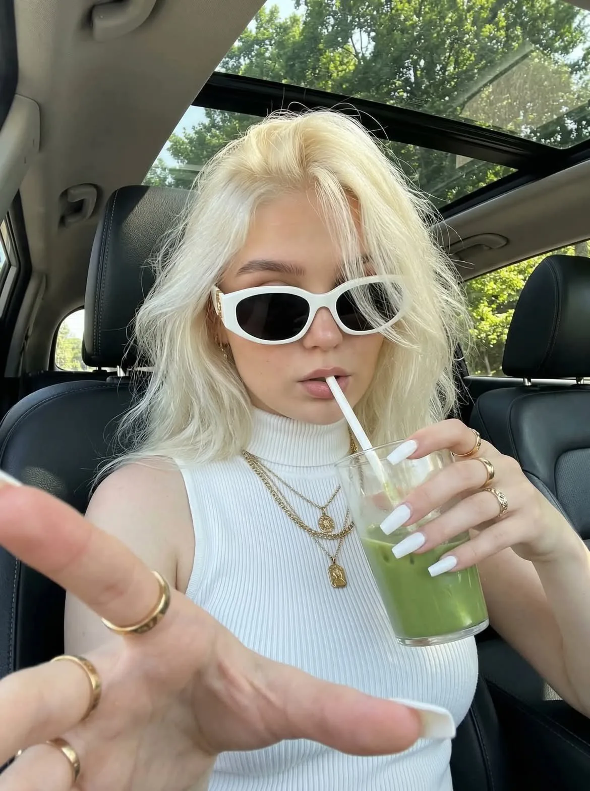 Backseat Selfie with Green Drink - Image prompt preview