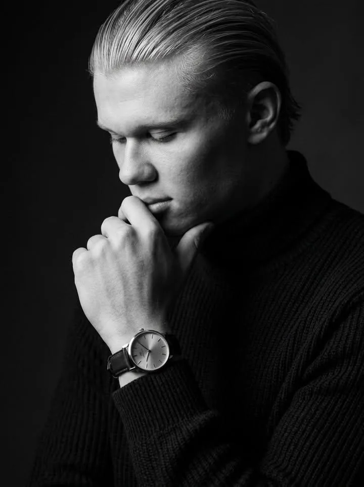 Photorealistic, hyperrealistic black-and-white men’s fashion editorial po...