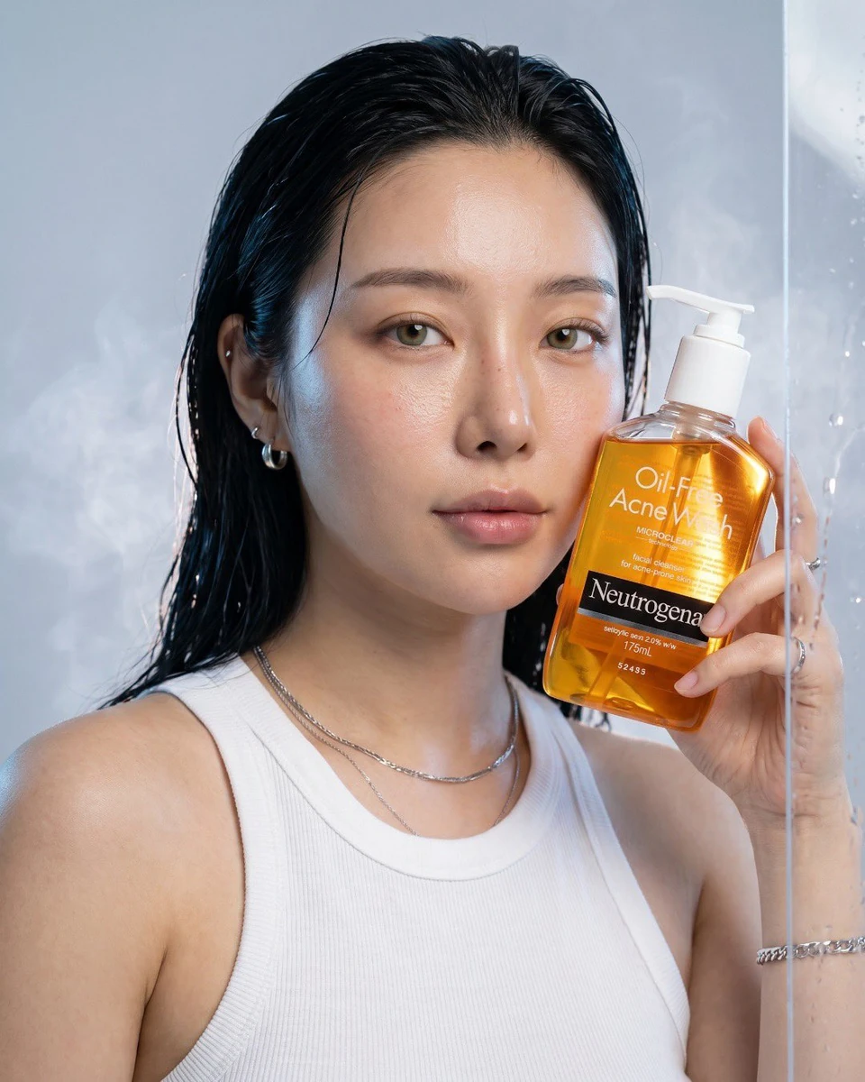 Ultra-realistic luxury skincare advertisement for Neutrogena Oil-Free Acn...