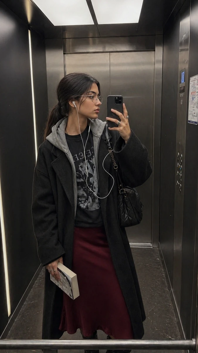 Ultra-realistic iPhone elevator mirror selfie, identity preserved exactly...