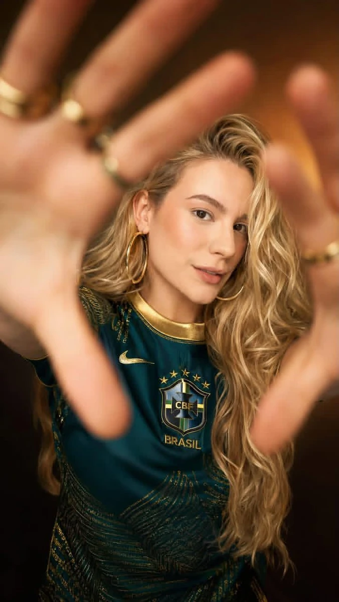 Ultra-realistic editorial fashion portrait of a beautiful young woman wea...