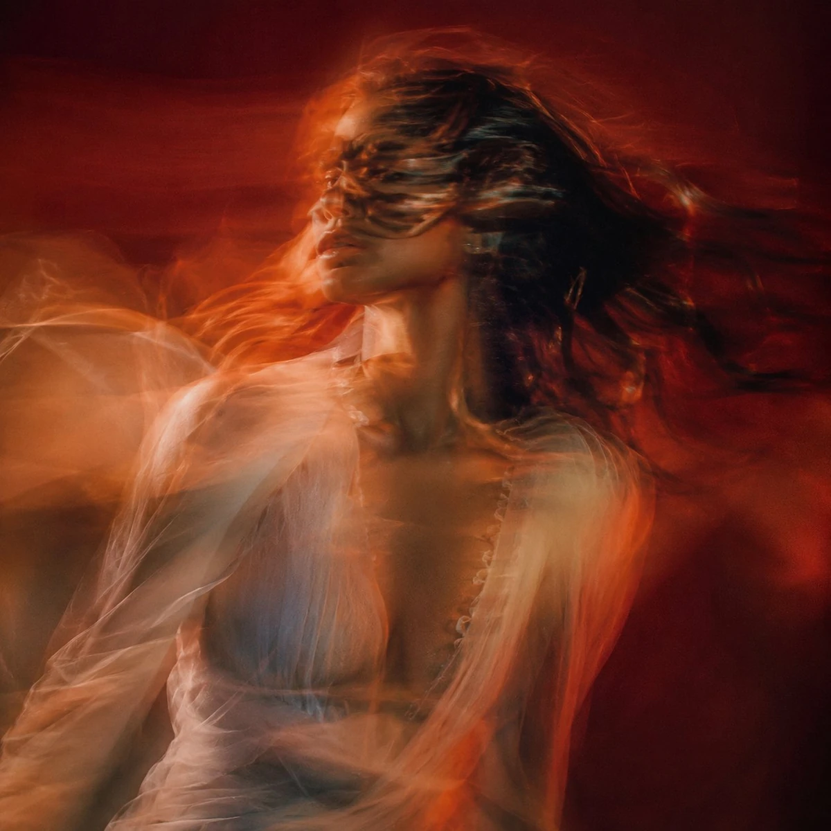Cinematic motion blurred portrait of a woman in fluid motion, face partia...