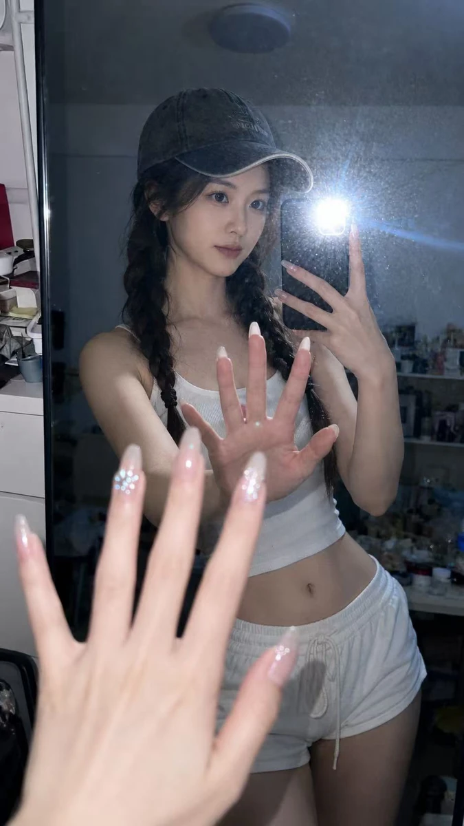 Late-night mirror flash selfie style