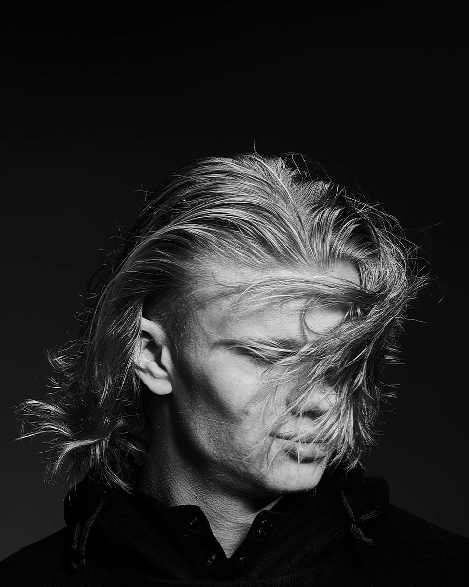 Ultra-luxury monochrome fashion portrait of a world-class football supers...